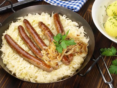 Sauerkraut and saussage - image.