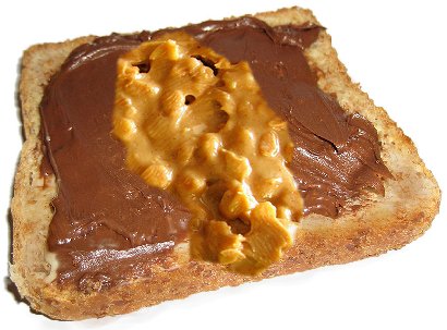 Hazelnut Nutella and peanutbutter of whole grain toast.