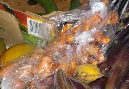 A bag of turmeric root in a Hilo farmers market.